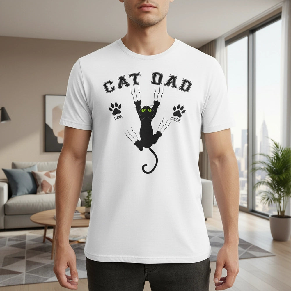 Custom Personalized Cat Dad T-Shirt with Paw Prints & Scratching Cat lifestyle photo
