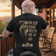Papa Bear Husband Protector Hero Bear T-Shirt on mountain cabin porch